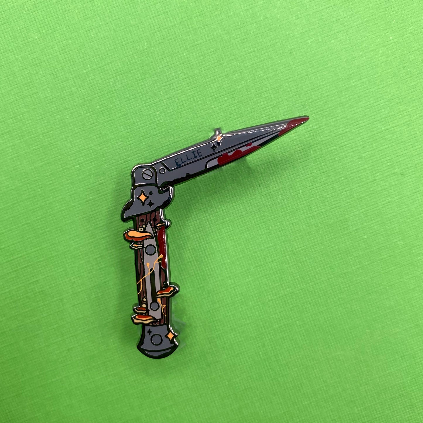 The Last of Us Ellie switchblade hard enamel pin - view 2 | Funky Punky Designs